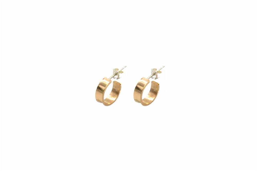 NEW PARADIGM DESIGN women's stillness huggies earrings in gold